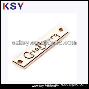 Light gold plated t shirt label with engraving logo